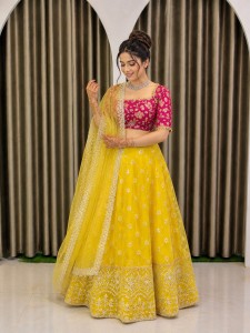 Yellow Lehenga with Rani Pink Rajestani Blouse