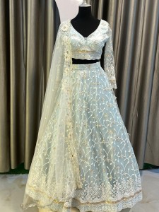 Light sky lehenga with golden details